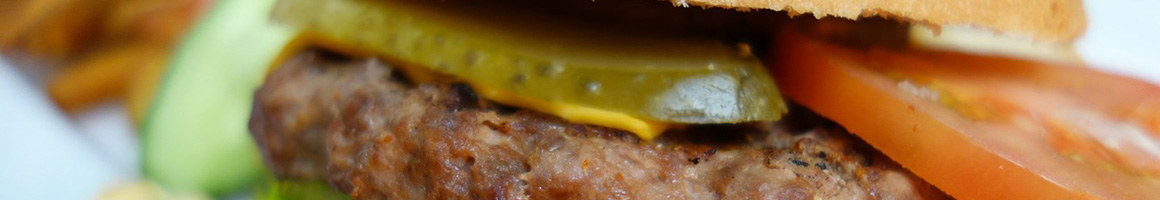 Eating Burger at Scaleburgers restaurant in Elbe, WA.